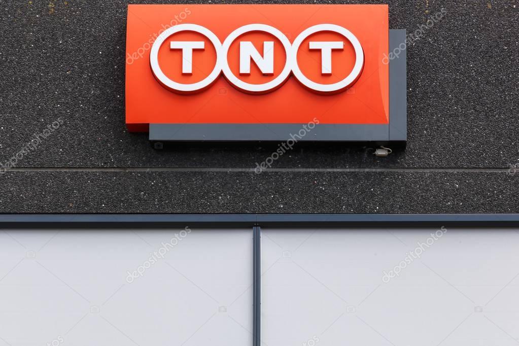 Kolding, Denmark - July 9, 2017: TNT logo sign on a facade. TNT is an international express, mail delivery and logistics services company with headquarters in Hoofddorp, Netherlands