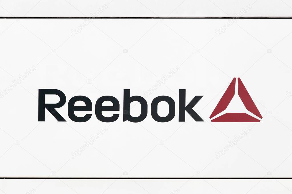 Hamburg, Germany - July 2., 2017: Reebok logo on a wall. Reebok is a global athletic footwear and apparel company, operating as a subsidiary of Adidas since 2005