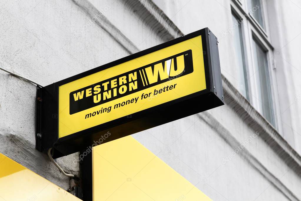 Aarhus, Denmark - July 15, 2017: Western Union sign and logo on a facade. The Western Union company is an american financial services and communications company