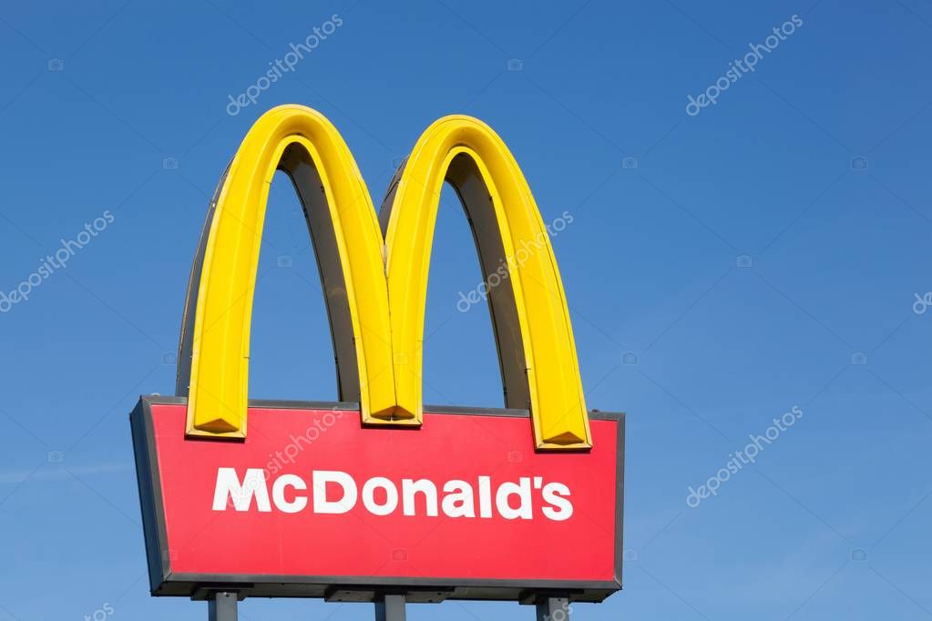 Stilling, Denmark - August 9, 2015: McDonald's logo on a pole. McDonald's is the world's largest chain of hamburger fast food restaurants