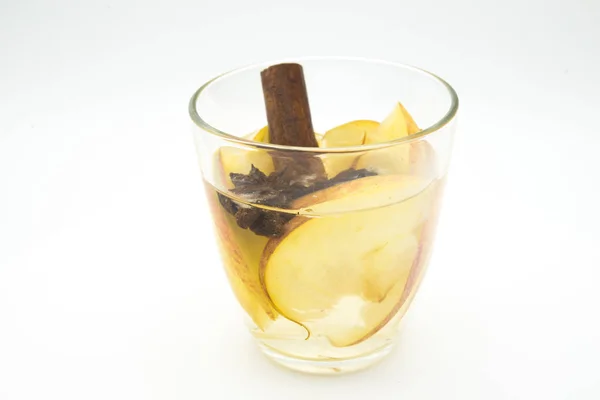 Hot drink (apple tea, punch) with cinnamon stick, star anise and — 스톡 사진