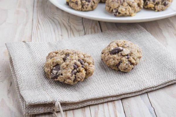 Oat and peanut butter cookies with pumpkin seeds and cinnamon — Stock Photo, Image