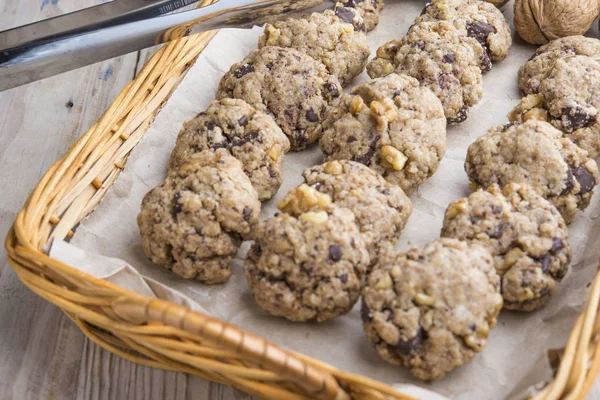 Homemade chocolate walnut cookies with ingredients and kitchen u — Stock Photo, Image