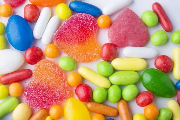 stock image colorful candies and jellies as background