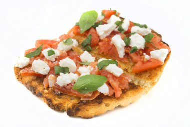 Domatesli İtalyan bruschetta, mozzarella peyniri ve fesleğen.