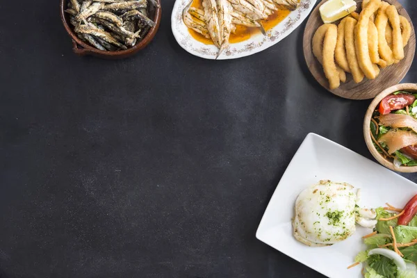 Variety of typical spanish fish — Stock Photo © Dalaifood #330120924