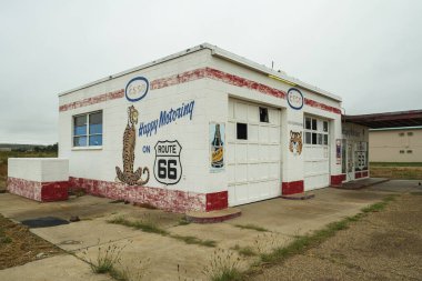 Tucumcari, New Mexico USA - October 4, 2019: Cityscape view of the vintage buildings and signs along the historic Route Highway 66 through this small town located in Quay County.