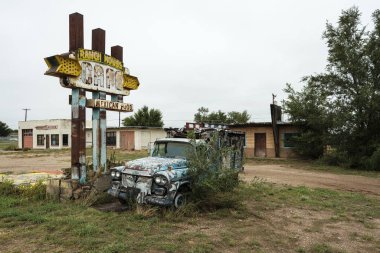 Tucumcari, New Mexico USA - October 4, 2019: Cityscape view of the vintage buildings and signs along the historic Route Highway 66 through this small town located in Quay County.