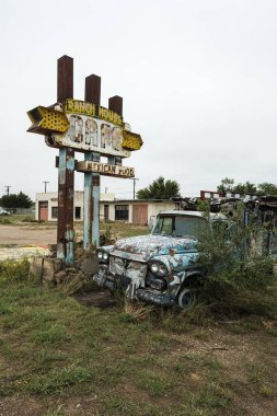 Tucumcari, New Mexico USA - October 4, 2019: Cityscape view of the vintage buildings and signs along the historic Route Highway 66 through this small town located in Quay County.