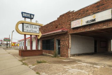 Tucumcari, New Mexico USA - October 4, 2019: Cityscape view of the vintage buildings and signs along the historic Route Highway 66 through this small town located in Quay County.