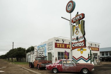 Tucumcari, New Mexico USA - October 4, 2019: Cityscape view of the vintage buildings and signs along the historic Route Highway 66 through this small town located in Quay County.