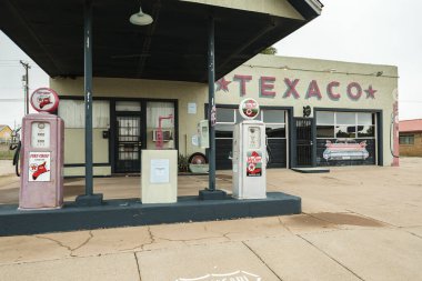 Tucumcari, New Mexico USA - October 4, 2019: Cityscape view of the vintage buildings and signs along the historic Route Highway 66 through this small town located in Quay County.
