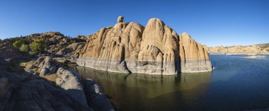 Panoramic view of the natural beauty of Watson Lake in Prescott, Arizona in the late afternoon. clipart