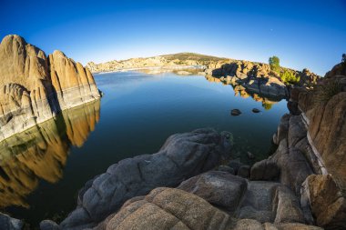 The natural beauty of Watson Lake in Prescott, Arizona in the late afternoon. clipart