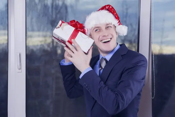 He's got a gift for Christmas — Stock Photo, Image