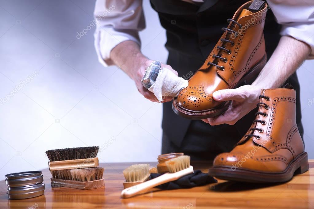 The process of cleaning shoes. 