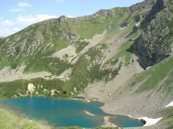 Huge mountains shot in summer on a journey. Climbing the Alps. Top down view.