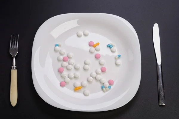 A plate tablets — Stock Photo, Image