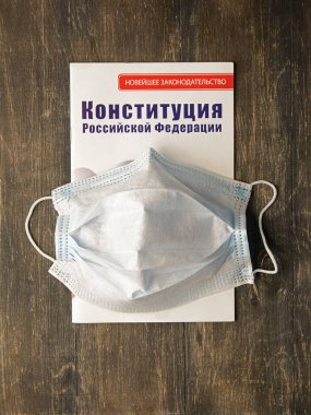 the Constitution of the Russian Federation in a medical mask clipart