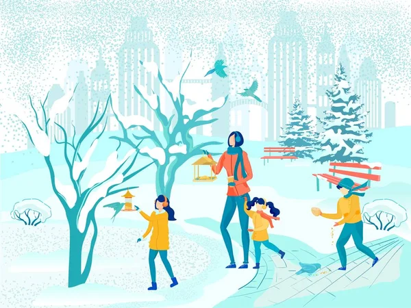 Anne ve Çocuklar Kış Şehri Parkı 'nda Kuşları Besliyor