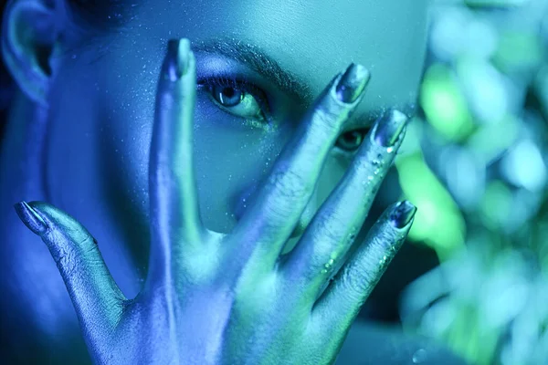 Beautiful high fashion girl with make up in neon colors blue beauty portrait in the image of an avatar close-up — Stock Photo, Image