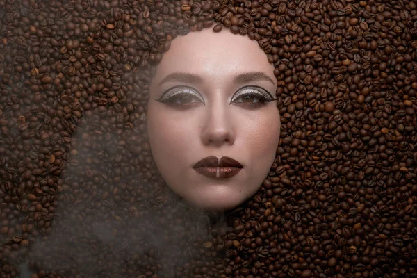 Beautiful girls with coffee beans