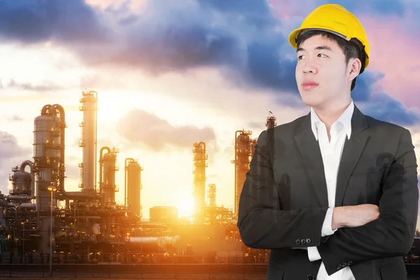 Double exposure of Engineer looking forward in oil refinery indu — Stockfoto