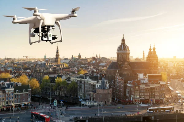 Drone with high resolution digital camera flying over Amsterdam — Stock Photo, Image