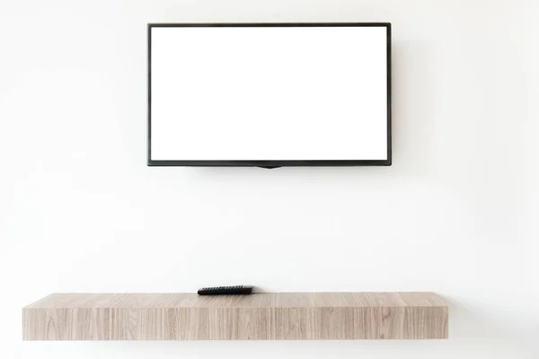 Mock up flatscreen tv met externe paneel op wwden plank in livin — Stockfoto