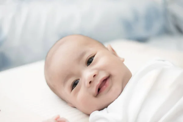 Portrait of cute 3 months Asian baby boy lying down on a blanket — Stock Photo, Image