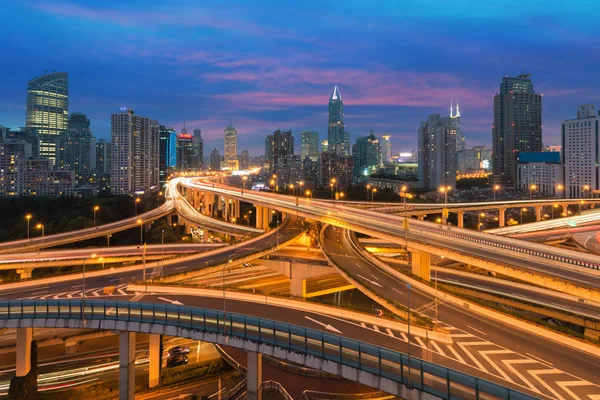 Beautiful Shanghai city with interchange overpass at nightfall in Shanghai, China. — Stock Photo, Image