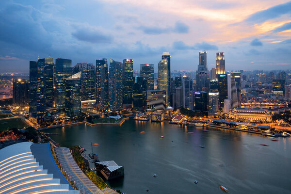 Panorama of Singapore business district skyline and Singapore skyscraperin night at Marina Bay, Singapore.