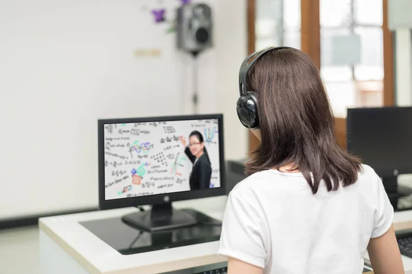 Asian woman student video conference e-learning with teacher on — Stock Photo, Image