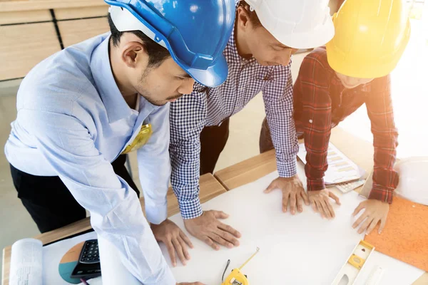 Asian engineer or architect meeting for architectural project. w — Stock Photo, Image