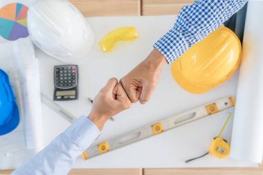 F vererek Asya takım iş veya mühendis ve mimarlar ortakları