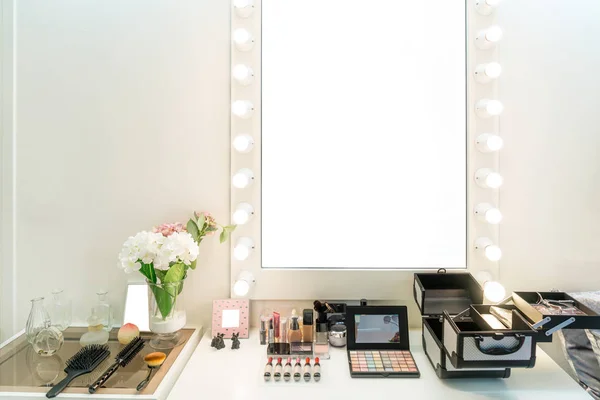 Modern closet room with make-up vanity table, mirror and cosmeti