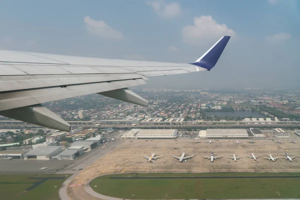 Aerial view of international airport with airplane parking. View