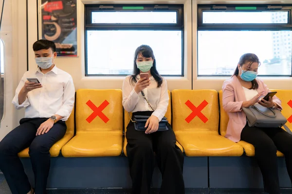 Three Asian People Wearing Mask Sitting Subway Distance One Seat — Stock Photo, Image