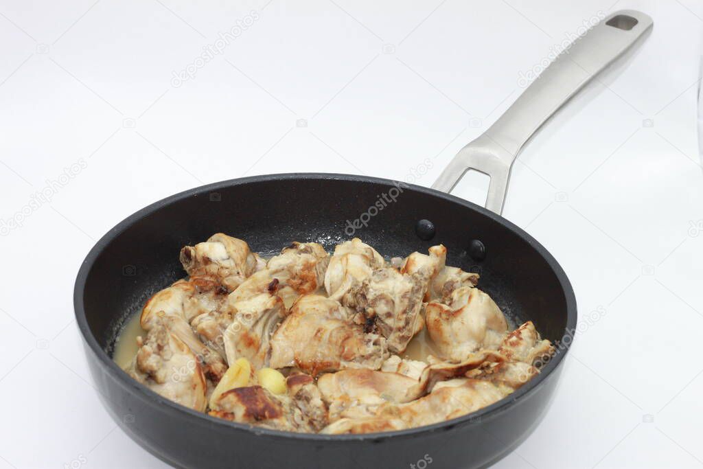 stewed rabbit in a pan