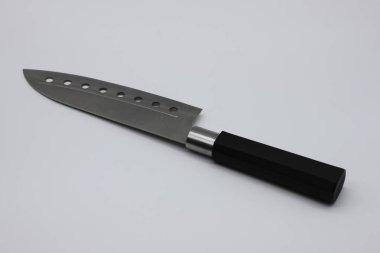 Beyaz arka planda profesyonel mutfak bıçağı.
