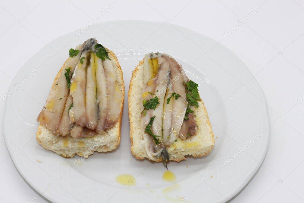 anchovies on freshly toasted bread
