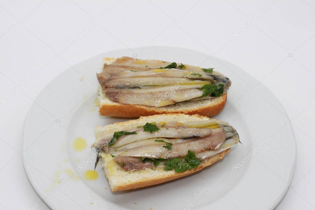 anchovies on freshly toasted bread