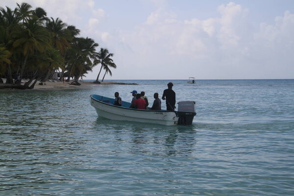 Punta Cana, Dominican Republic, September, 1, 2019: boats with tourists in the Caribbean Sea in the Dominican Republic