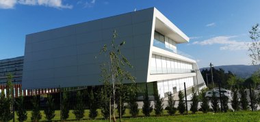 modern building with blue sky. the city in the background