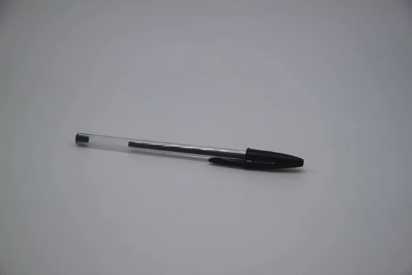 Schwarzer Stift Auf Weißem Hintergrund — Stockfoto