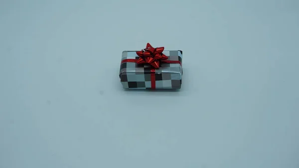 Gift Gray Checkered Paper Red Bow — Stock Photo, Image