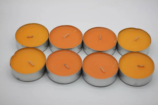 Żółte Pomarańczowe Świece Zapachowe Białym Tle — Zdjęcie stockowe