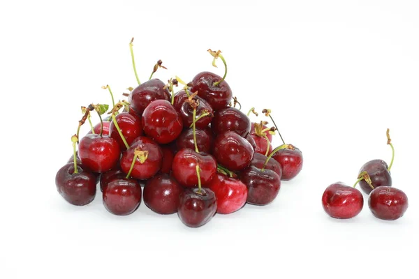 red cherries on white background