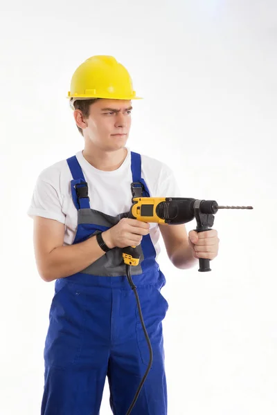 Construction worker with a drill — Stock Photo, Image