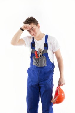 Sonra iş onun kaskını kaldırıldı ve onun alın teri silen tamirci